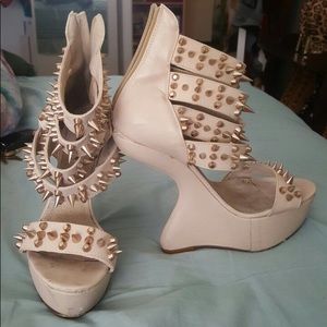 Tan Gravity heel wedges by Penny Sue with gold spikes